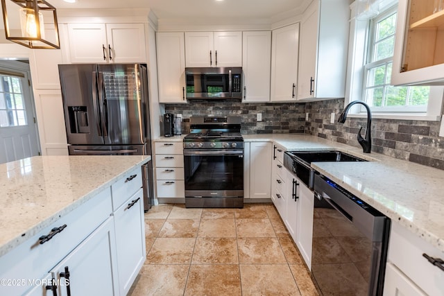 540 Vaughn Ave, Forked River, NJ 08731 - kitchen featuring stainless steel appliances, a sink, backsplash, and white cabinets