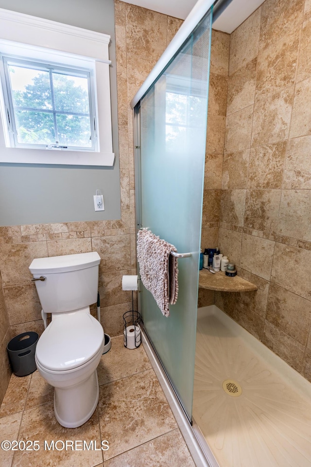 540 Vaughn Ave, Forked River, NJ 08731 - bathroom with tile walls, toilet, and a shower stall