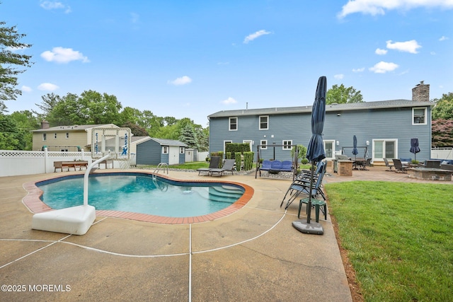 41 Revere Pl, Freehold, NJ 07728 - view of swimming pool featuring a patio and an outdoor fire pit