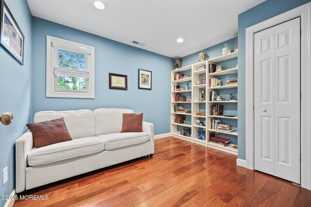 41 Revere Pl, Freehold, NJ 07728 - living area with wood finished floors, recessed lighting, and baseboards