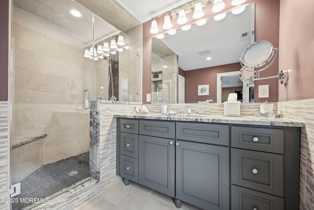 41 Revere Pl, Freehold, NJ 07728 - full bath featuring a stall shower, vanity, and tile walls