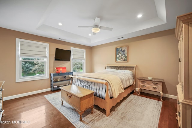 41 Revere Pl, Freehold, NJ 07728 - bedroom featuring a tray ceiling, wood finished floors, recessed lighting, baseboards, and ceiling fan