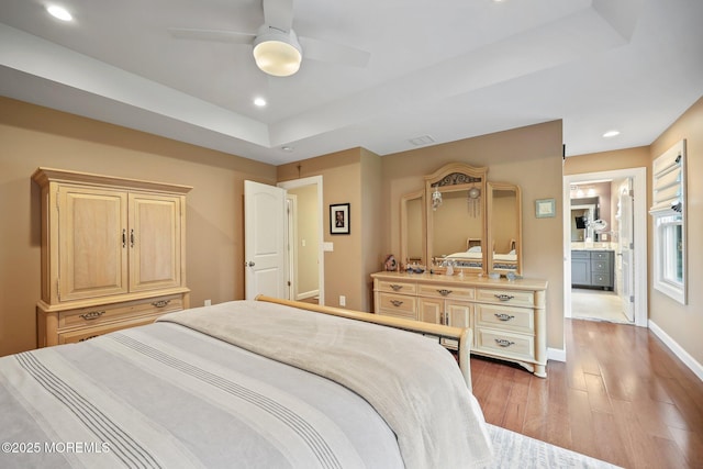41 Revere Pl, Freehold, NJ 07728 - bedroom with light wood-style floors, recessed lighting, baseboards, a raised ceiling, and a ceiling fan