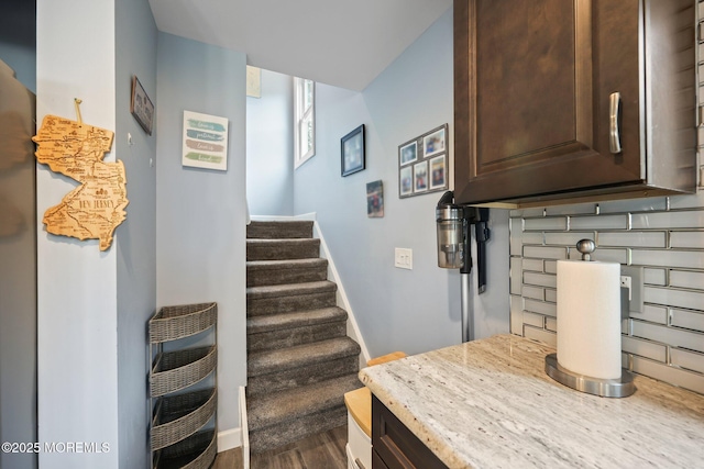 41 Revere Pl, Freehold, NJ 07728 - stairway with wood finished floors and baseboards