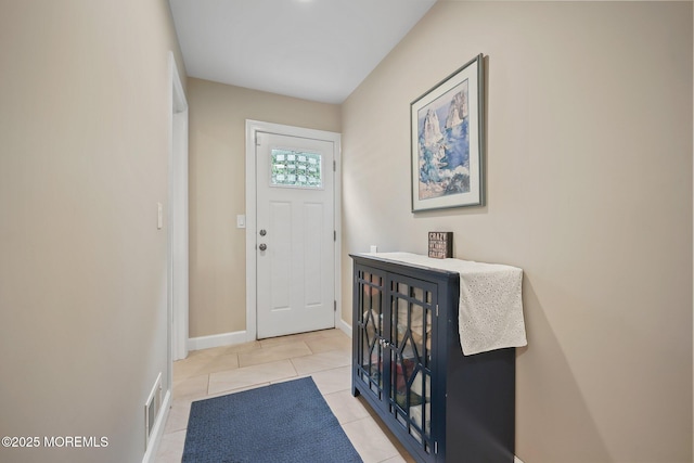 41 Revere Pl, Freehold, NJ 07728 - entryway with light tile patterned floors and baseboards