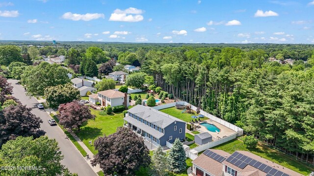 41 Revere Pl, Freehold, NJ 07728 - drone / aerial view of a forest and a pool area