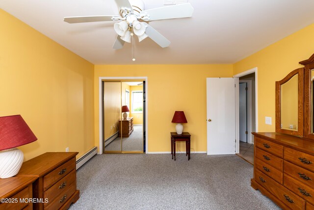 6 Manitoba Ct, Toms River, NJ 08757 - carpeted bedroom with baseboard heating and a ceiling fan