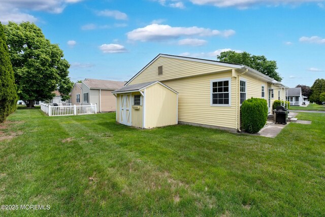 6 Manitoba Ct, Toms River, NJ 08757 - back of house featuring a yard