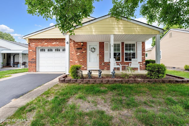6 Manitoba Ct, Toms River, NJ 08757 - view of front of house with a garage, a porch, brick siding, and asphalt driveway