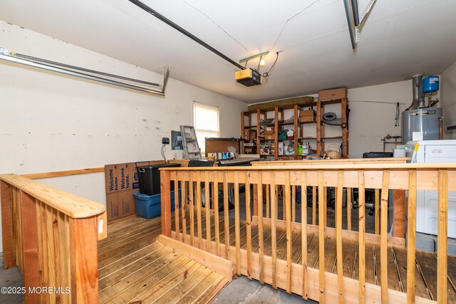 6 Manitoba Ct, Toms River, NJ 08757 - garage featuring a garage door opener and water heater