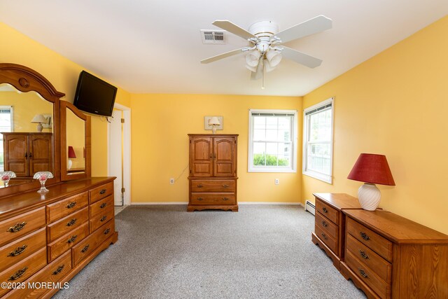 6 Manitoba Ct, Toms River, NJ 08757 - bedroom with light carpet, baseboard heating, multiple windows, and baseboards
