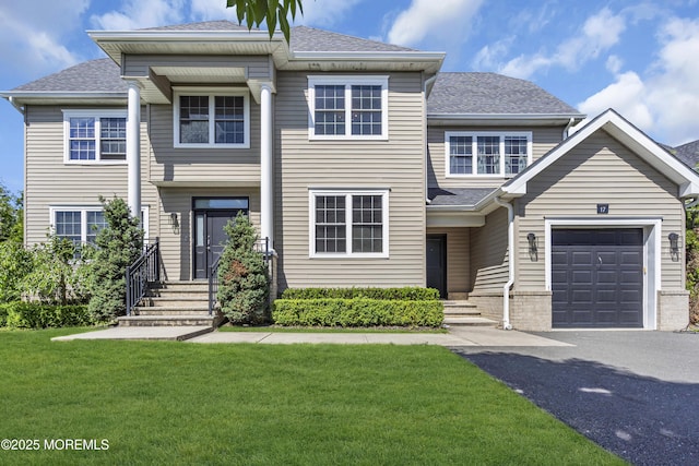 17 Grandview Dr, Lakewood, NJ 08701 - view of front of house with driveway, a front lawn, roof with shingles, and an attached garage