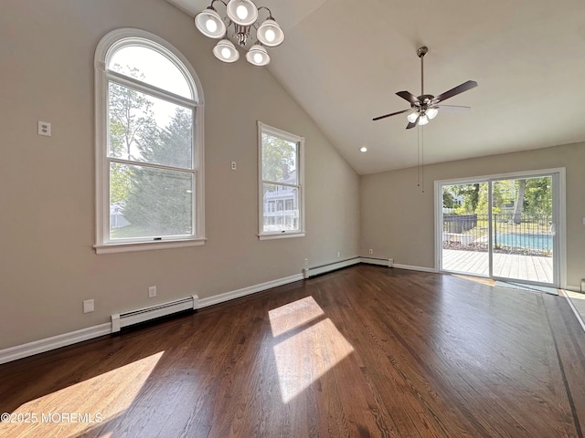 405 Old Bridge Rd, Brielle, NJ 08730 - spare room featuring a baseboard heating unit, vaulted ceiling, wood finished floors, and a chandelier