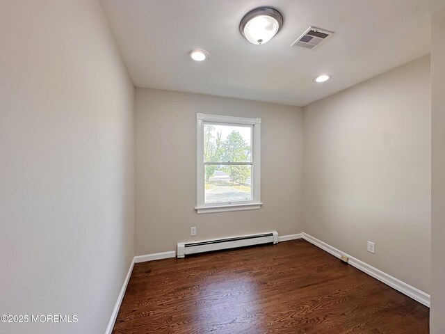 405 Old Bridge Rd, Brielle, NJ 08730 - unfurnished room with a baseboard radiator, baseboards, dark wood-style flooring, and recessed lighting