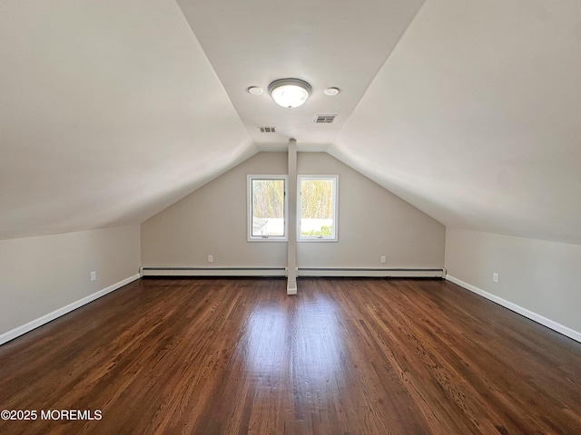 405 Old Bridge Rd, Brielle, NJ 08730 - bonus room with dark wood finished floors, vaulted ceiling, and baseboards