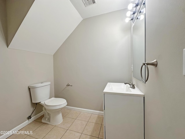 405 Old Bridge Rd, Brielle, NJ 08730 - half bathroom with vanity, lofted ceiling, toilet, tile patterned floors, and baseboards