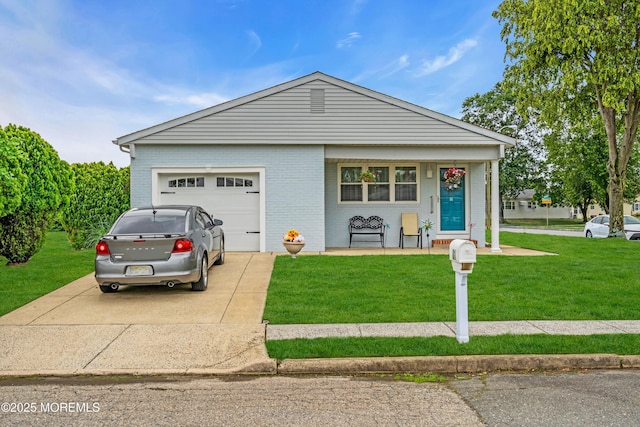 81 Encinitas Dr, Toms River, NJ 08757 - view of front of home featuring a front lawn, concrete driveway, a garage, and brick siding