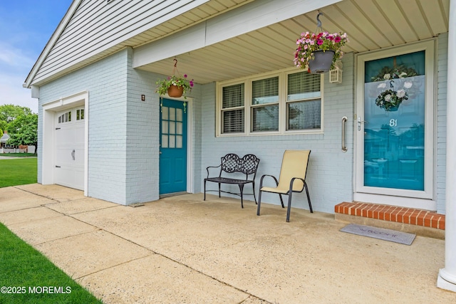 81 Encinitas Dr, Toms River, NJ 08757 - entrance to property with brick siding, a porch, and a garage