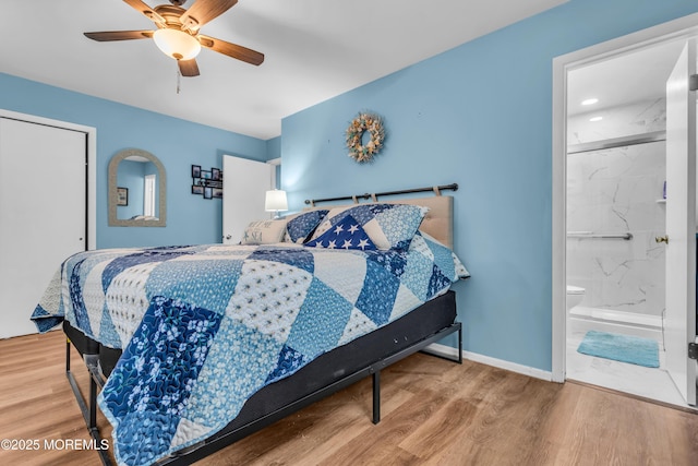81 Encinitas Dr, Toms River, NJ 08757 - bedroom with wood finished floors, baseboards, ceiling fan, and connected bathroom