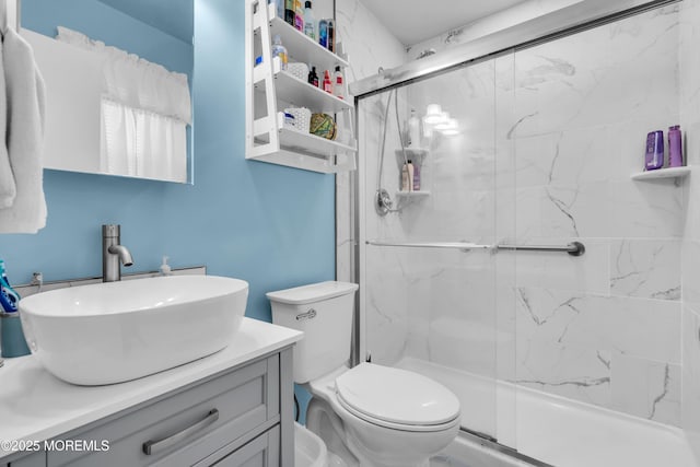 81 Encinitas Dr, Toms River, NJ 08757 - bathroom with a marble finish shower, vanity, and toilet