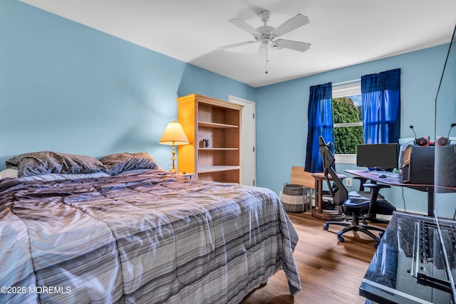 81 Encinitas Dr, Toms River, NJ 08757 - bedroom with wood finished floors, an office area, and a ceiling fan
