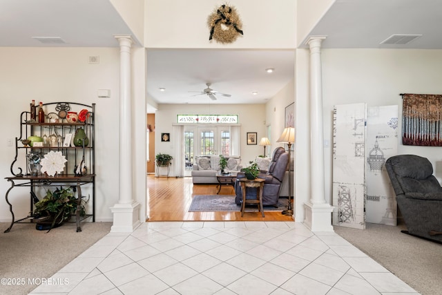 67 Isabella Dr, Manchester, NJ 08759 - entrance foyer with decorative columns, light tile patterned floors, and ceiling fan