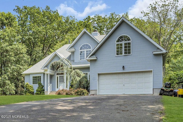 9 Rachel Ct, Jackson, NJ 08527 - traditional home featuring driveway, an attached garage, and a chimney