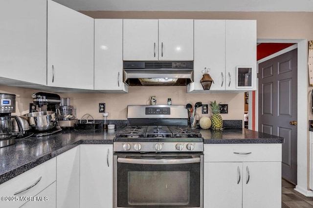 9 Rachel Ct, Jackson, NJ 08527 - kitchen with under cabinet range hood, stainless steel range with gas stovetop, white cabinetry, and dark countertops