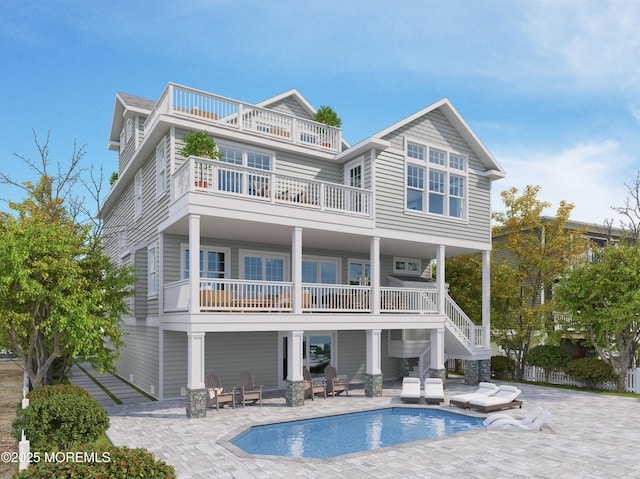 108 Rochester Dr, Brick, NJ 08723 - back of property with a balcony, a patio, an outdoor pool, and stairs