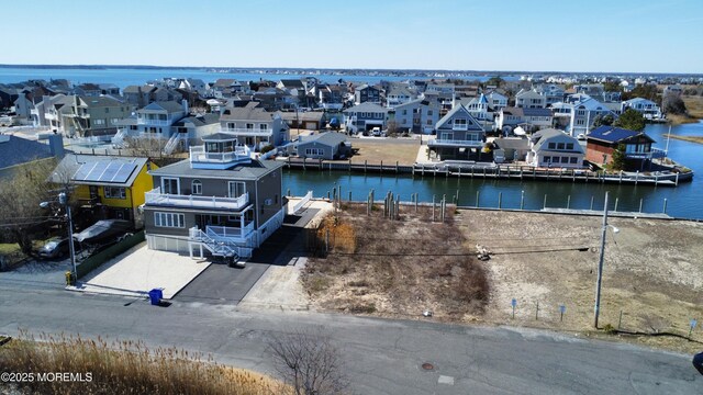 108 Rochester Dr, Brick, NJ 08723 - aerial perspective of suburban area featuring a large body of water