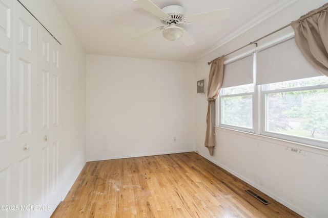 36 Merion Dr, Manalapan, NJ 07726 - unfurnished room with light wood-style floors, ceiling fan, and baseboards
