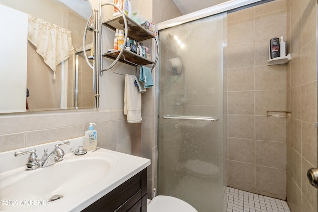 36 Merion Dr, Manalapan, NJ 07726 - bathroom featuring a stall shower, vanity, tile walls, and toilet
