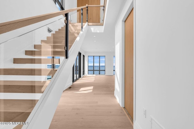 2 Brant Dr Lot 5.01, Atlantic Highlands, NJ 07716 - stairway featuring wood finished floors and a towering ceiling