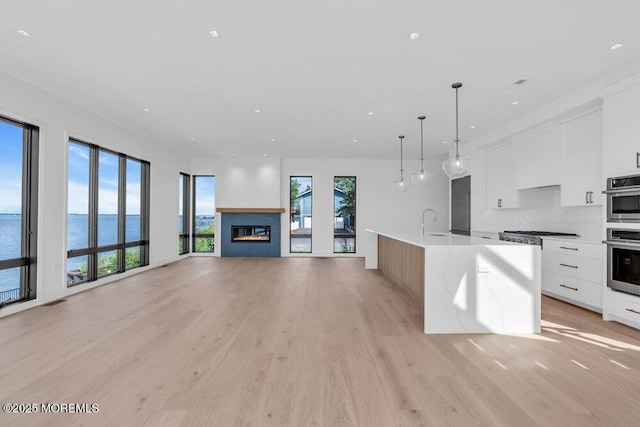2 Brant Dr Lot 5.01, Atlantic Highlands, NJ 07716 - kitchen featuring modern cabinets, light wood-type flooring, a water view, light countertops, and recessed lighting