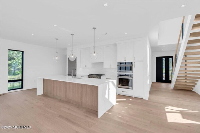 2 Brant Dr Lot 5.01, Atlantic Highlands, NJ 07716 - kitchen featuring light wood-style flooring, white cabinets, stainless steel appliances, light countertops, and recessed lighting