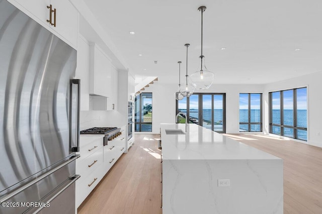 2 Brant Dr Lot 5.01, Atlantic Highlands, NJ 07716 - kitchen with appliances with stainless steel finishes, light wood-style flooring, a water view, white cabinets, and recessed lighting