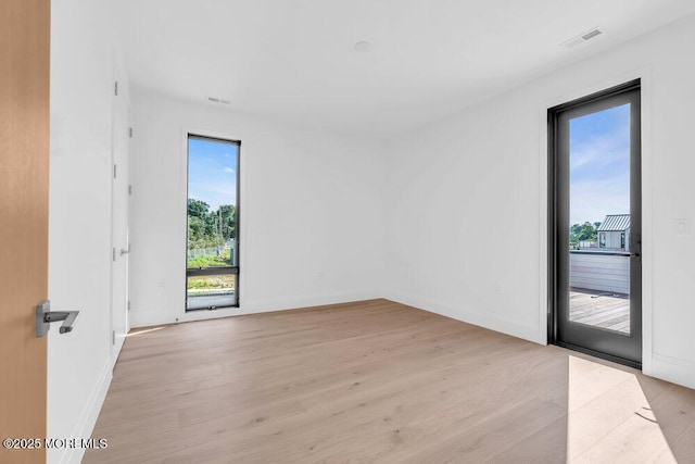 2 Brant Dr Lot 5.01, Atlantic Highlands, NJ 07716 - spare room with healthy amount of natural light and light wood-style floors