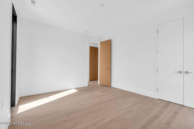 2 Brant Dr Lot 5.01, Atlantic Highlands, NJ 07716 - unfurnished bedroom featuring light wood-type flooring and a closet