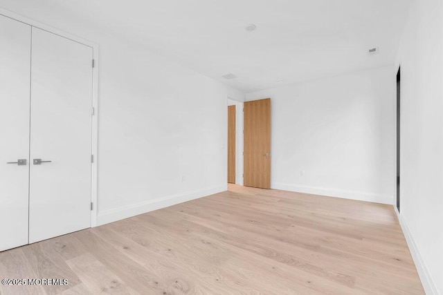 2 Brant Dr Lot 5.01, Atlantic Highlands, NJ 07716 - unfurnished bedroom featuring light wood-style floors and baseboards