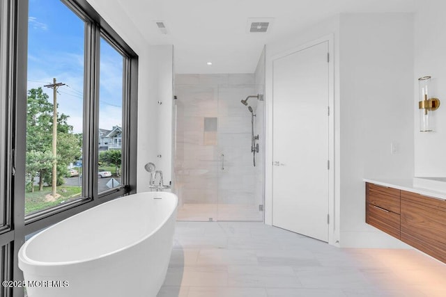 2 Brant Dr Lot 5.01, Atlantic Highlands, NJ 07716 - bathroom with a shower stall, a freestanding bath, healthy amount of natural light, and vanity