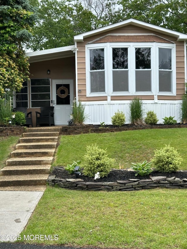 138 Oak Dr, Manchester, NJ 08759 - view of front of house featuring a front lawn