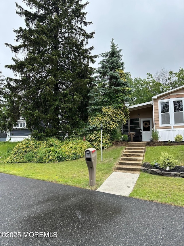 138 Oak Dr, Manchester, NJ 08759 - view of front of house featuring a front yard