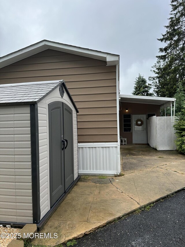 138 Oak Dr, Manchester, NJ 08759 - view of shed with a carport
