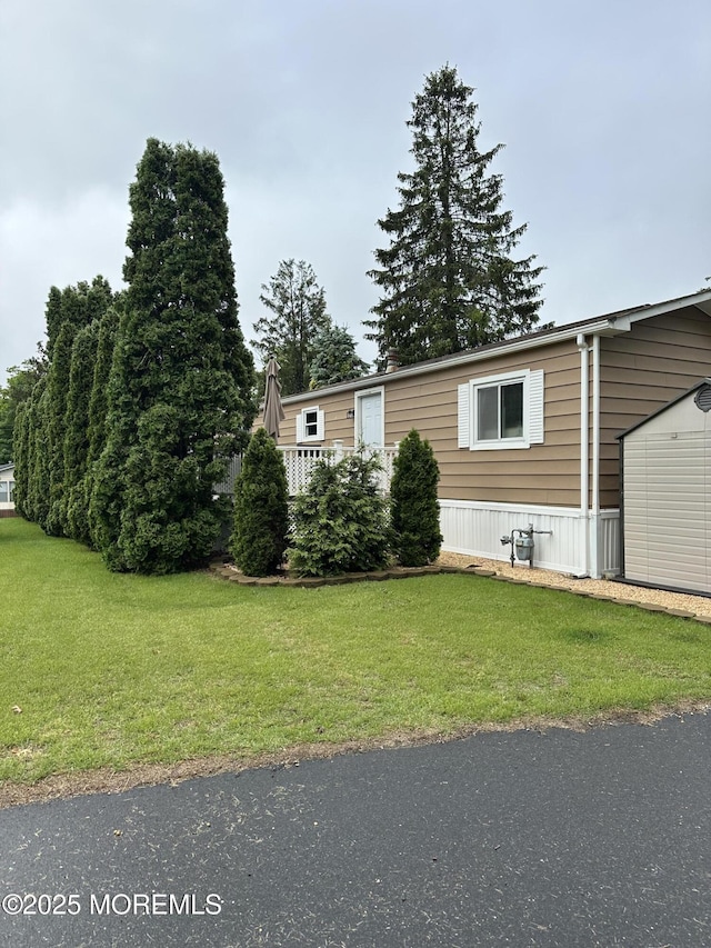138 Oak Dr, Manchester, NJ 08759 - manufactured / mobile home with a front yard