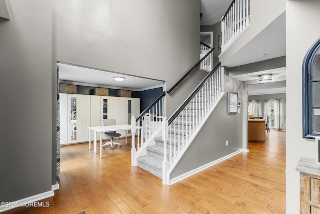 1 Kennedy Ct, Jackson, NJ 08527 - stairs with wood finished floors, baseboards, a towering ceiling, and crown molding