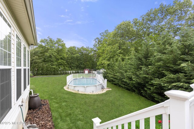 1 Kennedy Ct, Jackson, NJ 08527 - view of grassy yard featuring an outdoor pool