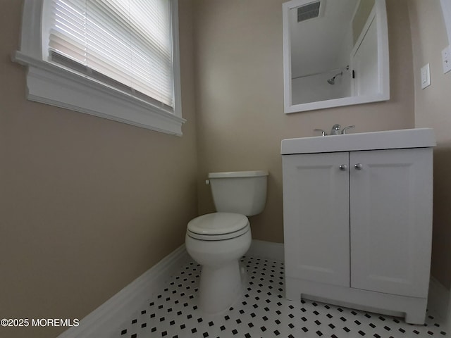 133 3rd Ave, Neptune City, NJ 07753 - bathroom featuring baseboards, vanity, toilet, and tile patterned floors