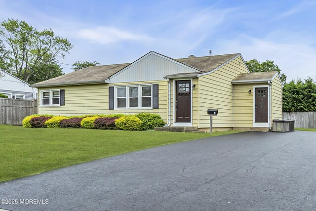 18 Delaware Ave, West Long Branch, NJ 07764 - view of front of house with roof with shingles