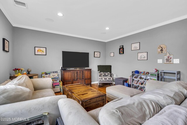 18 Delaware Ave, West Long Branch, NJ 07764 - living area featuring crown molding, recessed lighting, and wood finished floors
