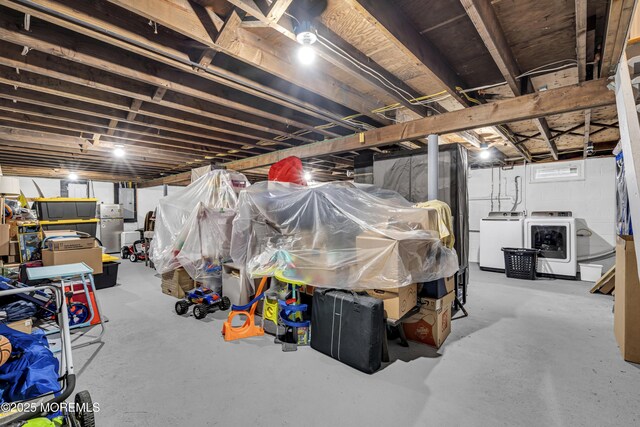 18 Delaware Ave, West Long Branch, NJ 07764 - unfinished basement featuring washer and clothes dryer